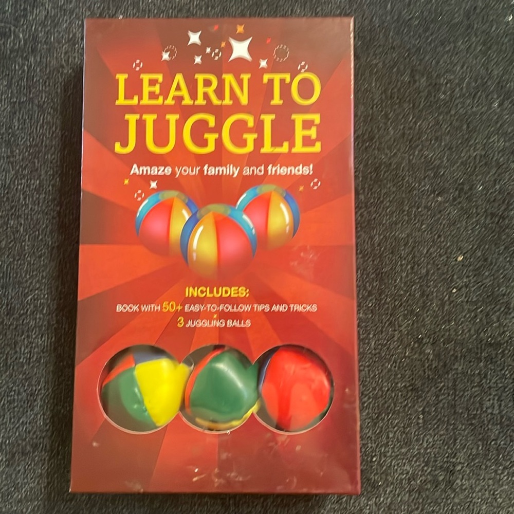 Learn to Juggle. Includes 3 juggling balls and a tips and tricks book.